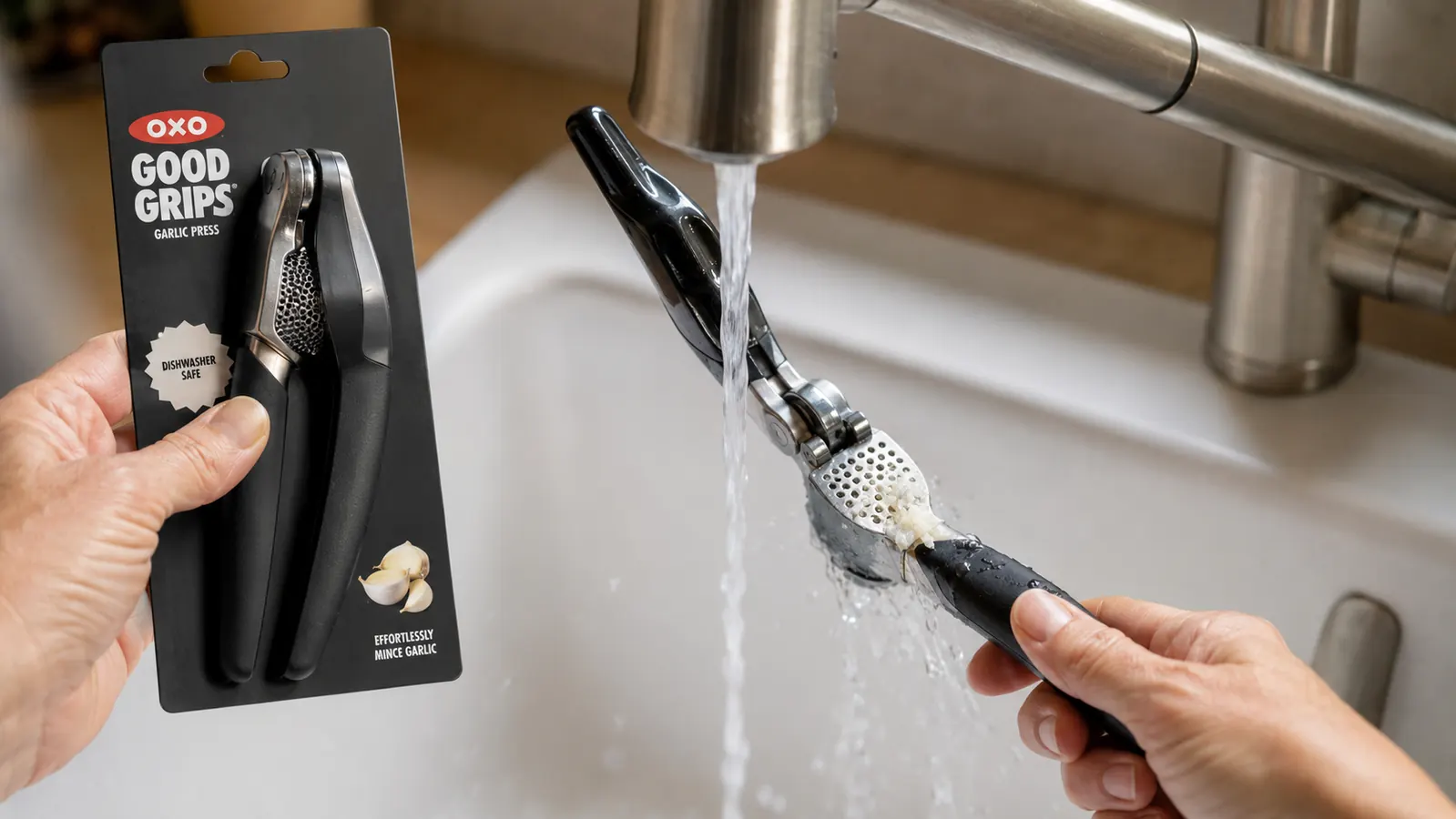 OXO garlic press being rinsed under running tap water, showing the built-in cleaner pins pushing residue out of the hopper holes